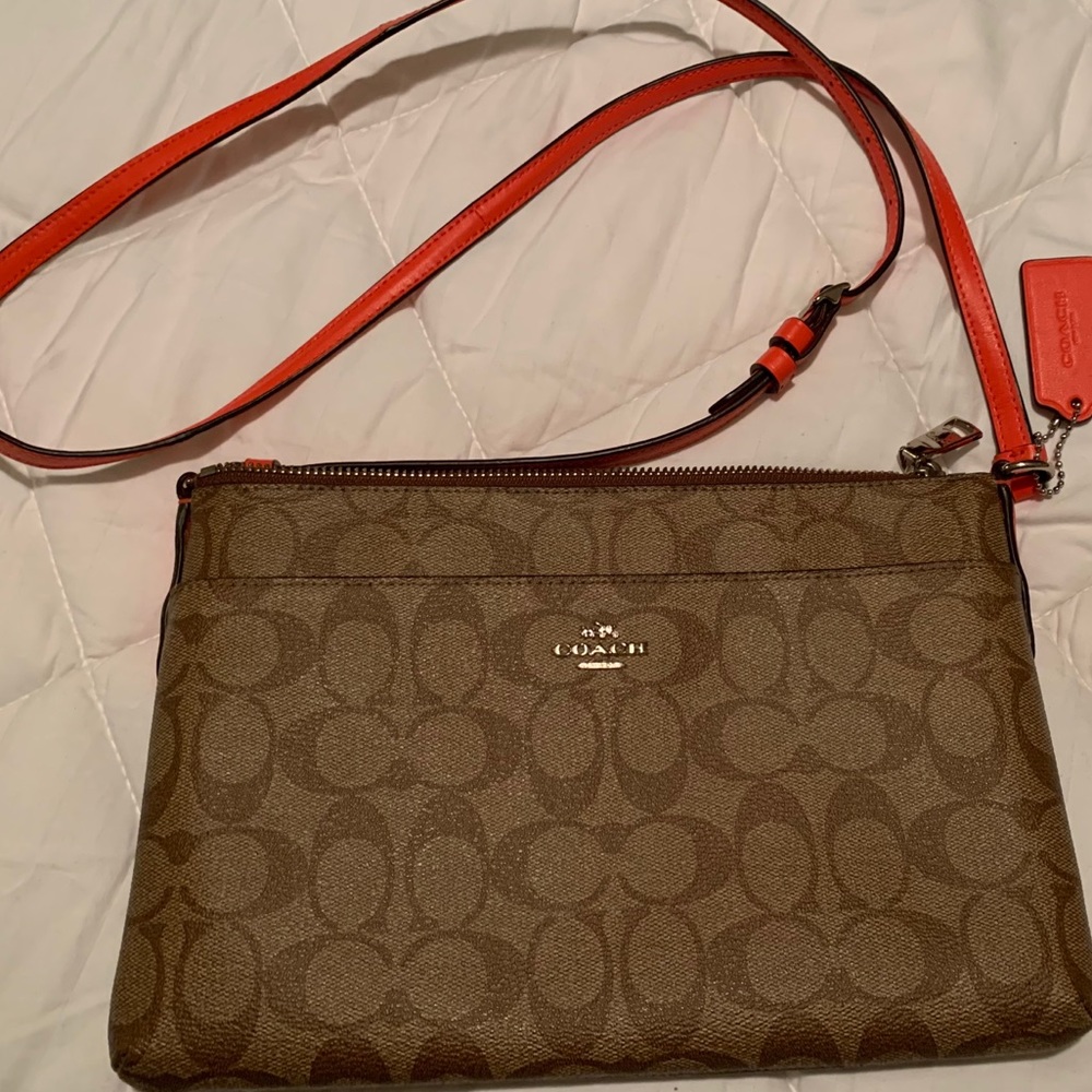 Coach tan signature crossbody with orange strap
